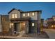 Charming two-story home with stone accents, well-manicured landscaping, and an inviting entrance at 23990 E 41St Ave, Aurora, CO 80019