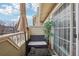Charming balcony featuring a seating area and scenic views at 1818 S Quebec Way # 11-3, Denver, CO 80231