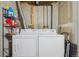 Unfinished basement area with washer and dryer hookups for convenience at 1818 S Quebec Way # 11-3, Denver, CO 80231