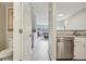 Welcoming entryway showcasing the transition from the hall to the living space at 1818 S Quebec Way # 11-3, Denver, CO 80231
