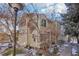 Charming multi-story home featuring mature landscaping and a well-maintained lawn at 1818 S Quebec Way # 11-3, Denver, CO 80231