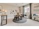 Cozy playroom with a table and chairs, storage, decor and natural light from a large window at 13333 Blue Amber Ct, Parker, CO 80134
