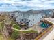 Aerial view of home featuring solar panels, expansive backyard with deck and play area at 1114 Basalt Ridge Loop, Castle Rock, CO 80108