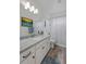 Bright bathroom with granite counters, white cabinets, and modern fixtures at 1114 Basalt Ridge Loop, Castle Rock, CO 80108