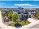 Charming home featuring well-maintained landscaping, a cozy front porch, and a backyard play area at 1114 Basalt Ridge Loop, Castle Rock, CO 80108