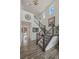 Grand foyer with high ceilings, staircase, and stylish decor creating an inviting entrance to the home at 1114 Basalt Ridge Loop, Castle Rock, CO 80108