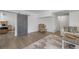Spacious living area featuring stylish decor, a sliding barn door, and ample natural light at 1114 Basalt Ridge Loop, Castle Rock, CO 80108