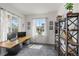 Bright home office with ample natural light, modern furnishings, and a minimalist design to create focus at 1114 Basalt Ridge Loop, Castle Rock, CO 80108
