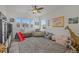 Spacious playroom filled with toys, features bright natural light, creating a fun and welcoming environment at 1114 Basalt Ridge Loop, Castle Rock, CO 80108