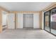 Spacious bedroom features with closet and access to a private balcony at 9837 E Peakview Ave # D05, Englewood, CO 80111