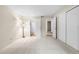 Neutral bedroom features plush carpet, ample closet space, and ensuite bath access at 9837 E Peakview Ave # D05, Englewood, CO 80111