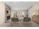 Inviting living room featuring a stone fireplace, comfortable seating, and stylish decor at 9837 E Peakview Ave # D05, Englewood, CO 80111