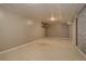 Finished basement area with carpet and painted walls provides versatile extra living space at 11241 Ogden Dr, Northglenn, CO 80233