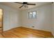 Sun-filled bedroom with hardwood floors, closet, and ceiling fan creates a relaxing atmosphere at 11241 Ogden Dr, Northglenn, CO 80233