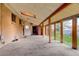 Sunroom with carpet and walls of windows at 11241 Ogden Dr, Northglenn, CO 80233