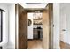 Custom bar area with wine storage and elegant wood finishes, perfect for entertaining at 2821 E Cedar Ave # 2, Denver, CO 80209