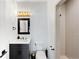 Modern bathroom featuring a sleek vanity, stylish fixtures, and a walk-in shower at 2821 E Cedar Ave # 2, Denver, CO 80209