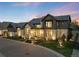 Elegant two-story home with a stone and gray exterior, professionally landscaped front yard, and inviting entrance at 2821 E Cedar Ave # 2, Denver, CO 80209