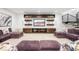 Comfortable living room featuring built-in shelving and plush seating at 2821 E Cedar Ave # 2, Denver, CO 80209