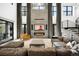 Bright living room boasting high ceilings, a modern fireplace, and stylish contemporary decor at 2821 E Cedar Ave # 2, Denver, CO 80209
