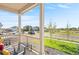 Front porch featuring a view of the yard, street, and other houses in the neighborhood at 4125 Marble Dr, Longmont, CO 80504