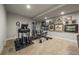 Home gym equipped with modern exercise equipment and ample space for a complete workout at 5069 Castle Pines S Dr, Castle Rock, CO 80108