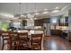 Spacious kitchen island with sleek appliances and plenty of counter seating at 5069 Castle Pines S Dr, Castle Rock, CO 80108