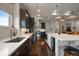 Gourmet kitchen with modern appliances, an island, and abundant counter space at 5069 Castle Pines S Dr, Castle Rock, CO 80108