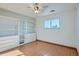 Bedroom with built-in storage and a sunny window for natural light at 16259 W 10Th Ave # J5, Golden, CO 80401