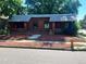 Charming brick duplex with individual entrances and well-maintained front yards at 292 S Lafayette St, Denver, CO 80209