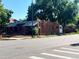 Brick duplex featuring street view and mature landscaping at 292 S Lafayette St, Denver, CO 80209