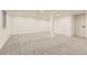 Spacious finished basement with neutral carpeting and recessed lighting at 10330 E Jewell Ave # 67, Aurora, CO 80247