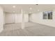 Finished basement offering ample space and neutral carpeting at 10330 E Jewell Ave # 67, Aurora, CO 80247