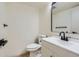 Modern bathroom with white vanity and black accents at 10330 E Jewell Ave # 67, Aurora, CO 80247