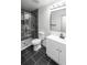 Bathroom showcasing glass-enclosed shower and modern vanity at 10330 E Jewell Ave # 67, Aurora, CO 80247