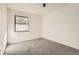 Spacious bedroom with neutral carpeting and window at 10330 E Jewell Ave # 67, Aurora, CO 80247