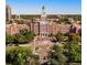 Aerial view of university campus featuring historic buildings, green spaces, and pedestrian walkways at 1141 Adams St, Denver, CO 80206