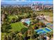 Aerial view capturing urban park with sports facilities, swimming pool, and recreational areas at 1141 Adams St, Denver, CO 80206