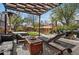 Outdoor living space including comfortable lounge seating and dining area at 1141 Adams St, Denver, CO 80206