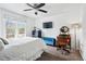 Sunlit bedroom featuring a comfortable bed, stylish decor, and cozy ambiance at 1141 Adams St, Denver, CO 80206
