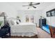 Bright bedroom with a large window, white walls, and comfortable furnishings at 1141 Adams St, Denver, CO 80206