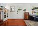 Inviting entryway features hardwood floors, stylish decor, and great natural light at 1141 Adams St, Denver, CO 80206