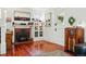 Cozy living room showcasing a fireplace, hardwood floors, and stylish decor at 1141 Adams St, Denver, CO 80206