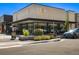 Inviting CAVA restaurant exterior, featuring outdoor seating and lush landscaping at 1141 Adams St, Denver, CO 80206