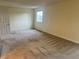 Bedroom with neutral walls and carpet at 7906 W Walker Dr, Littleton, CO 80123