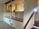 Kitchen featuring white cabinets, pendant lighting, and modern appliances at 7906 W Walker Dr, Littleton, CO 80123