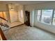 Living room with tile entry featuring a large window and a view of the exterior at 7906 W Walker Dr, Littleton, CO 80123