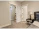 Neutral bedroom with carpet floors, light walls and ceilings, with doorway into the ensuite bath and walk-in closet at 2568 Clermont St, Denver, CO 80207