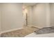 Cozy bedroom with neutral tones, carpet, and two bright windows at 2568 Clermont St, Denver, CO 80207