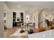 Well-lit flex room with built-in shelving and stylish decor, perfect for a home office at 2568 Clermont St, Denver, CO 80207